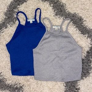 Two EARTHBOUND tank tops